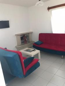 A seating area at Paradise Apart Hotel