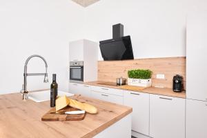 Kuchyň nebo kuchyňský kout v ubytování Unique Design Vila Doris