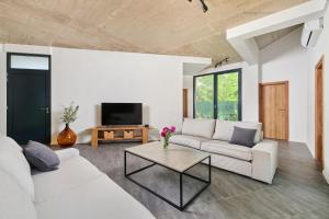 Posezení v ubytování Unique Design Vila Doris