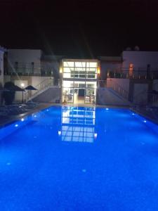 The swimming pool at or close to Paradise Apart Hotel