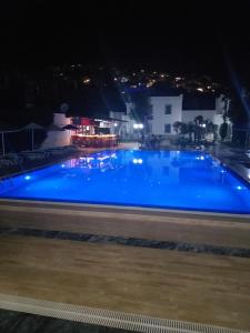 The swimming pool at or close to Paradise Apart Hotel