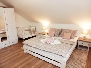 Posteľ alebo postele v izbe v ubytovaní Apartmán pod Sivým vrchom
