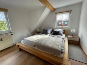 Postel nebo postele na pokoji v ubytování Landhaus Wiesengrund