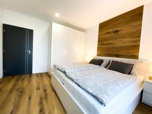 Postel nebo postele na pokoji v ubytování Apartmány DOME