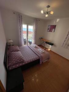 Postel nebo postele na pokoji v ubytování Villa Popic