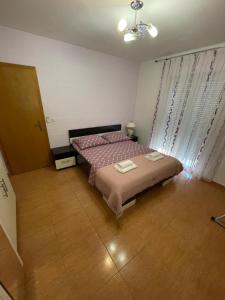 Postel nebo postele na pokoji v ubytování Villa Popic