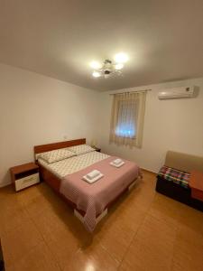 Postel nebo postele na pokoji v ubytování Villa Popic
