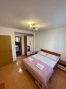 Postel nebo postele na pokoji v ubytování Villa Popic
