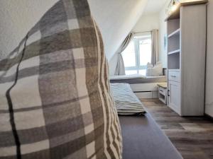 Postel nebo postele na pokoji v ubytování Ferienwohnung Langeneß