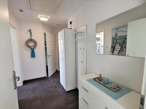 Kuchyň nebo kuchyňský kout v ubytování Ferienwohnung Langeneß