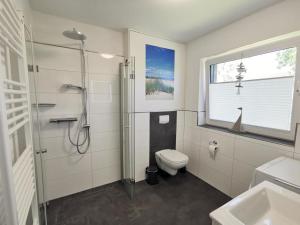 Koupelna v ubytování Ferienwohnung Langeneß