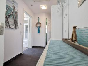 Postel nebo postele na pokoji v ubytování Ferienwohnung Langeneß
