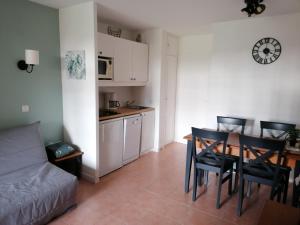 Кухня или мини-кухня в Bonheur

