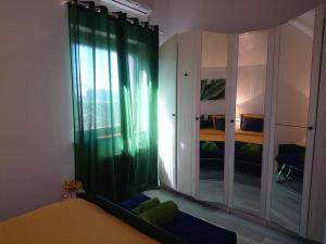Łóżko lub łóżka w pokoju w obiekcie Vacation Home Vidučić