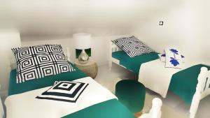 Łóżko lub łóżka w pokoju w obiekcie Vacation Home Vidučić