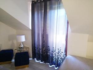 Łóżko lub łóżka w pokoju w obiekcie Vacation Home Vidučić