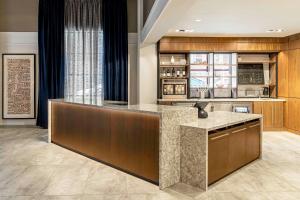 a kitchen with a large island in a room at New Haven Hotel in New Haven