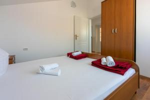Ένα ή περισσότερα κρεβάτια σε δωμάτιο στο Apartments BRANA +53 φωτογραφίες