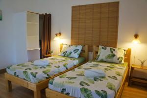 Postel nebo postele na pokoji v ubytování Hotel Renate