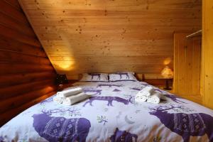 Ένα ή περισσότερα κρεβάτια σε δωμάτιο στο Chalet Ograjčica