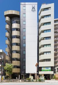 a building with a spider on the side of it at Asta Hotel in Tokyo