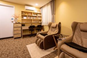 Hotel Kuretakeso Thailand Sriracha - SHA Extra Plus的休息区