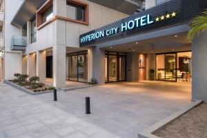 a hotel entrance with a sign that reads infusion city hotel at Hyperion City Hotel & Spa in Chania