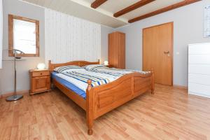Postel nebo postele na pokoji v ubytování Ferienwohnung Deichtor im Haus am Deichtor