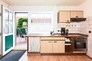 Kuchyň nebo kuchyňský kout v ubytování Ferienwohnung Deichtor im Haus am Deichtor