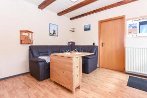 Posezení v ubytování Ferienwohnung Deichtor im Haus am Deichtor