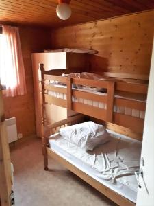 Letto o letti in una camera di Chalet Ardennais 240 - La Boverie - Rendeux