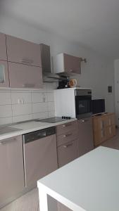 Kuchyň nebo kuchyňský kout v ubytování Apartments Matej & Irena