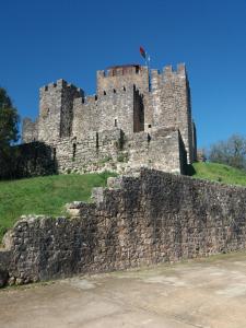 a castle on top of a stone wall at Casa Hozani in Albarrol