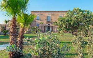 Um jardim em Pietra d'Acqua Resort & Spa by Geocharme