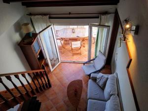 an overhead view of a living room with a couch at Ático, Islantilla in Islantilla