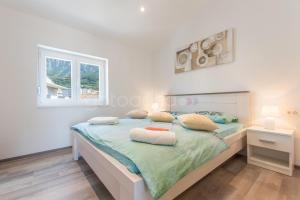 Posteľ alebo postele v izbe v ubytovaní Seaview Penthouse Milano