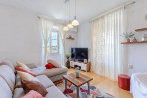 TV a/nebo společenská místnost v ubytování Apartman Mare