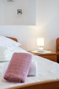 Postel nebo postele na pokoji v ubytování Apartman Mare