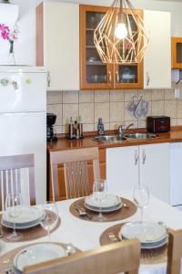 Kuchyň nebo kuchyňský kout v ubytování Apartman Mare
