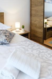 Postel nebo postele na pokoji v ubytování Apartman Mare