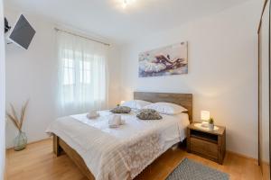 Postel nebo postele na pokoji v ubytování Apartman Mare