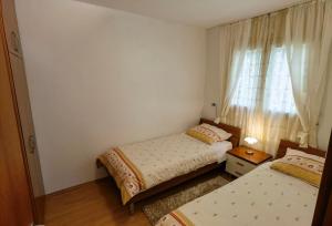 Postel nebo postele na pokoji v ubytování Jees Exclusive Apartments Hvar