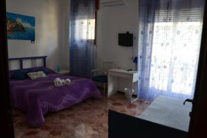 Letto o letti in una camera di A Due Passi da Erice B&B