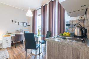 Kuchyňa alebo kuchynka v ubytovaní Apartman Chiara