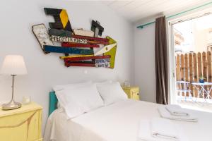 Кровать или кровати в номере Armenaki Apartment at the center of Zakynthos Town
