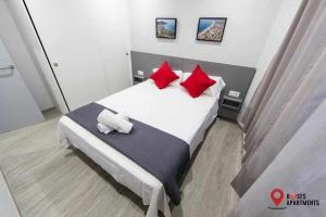 Ένα ή περισσότερα κρεβάτια σε δωμάτιο στο Roses Apartments Beach - 3 rooms 2baths