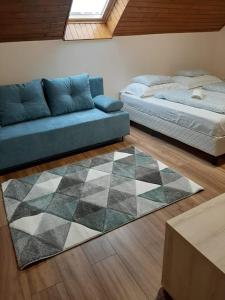 Postel nebo postele na pokoji v ubytování Natúra Panzió&Apartmanház