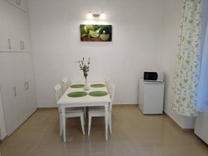 Kuchyňa alebo kuchynka v ubytovaní Dolina Apartman