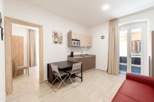 A kitchen or kitchenette at DOMO ALLE