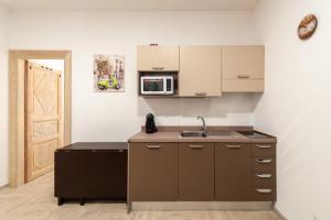 A kitchen or kitchenette at DOMO ALLE